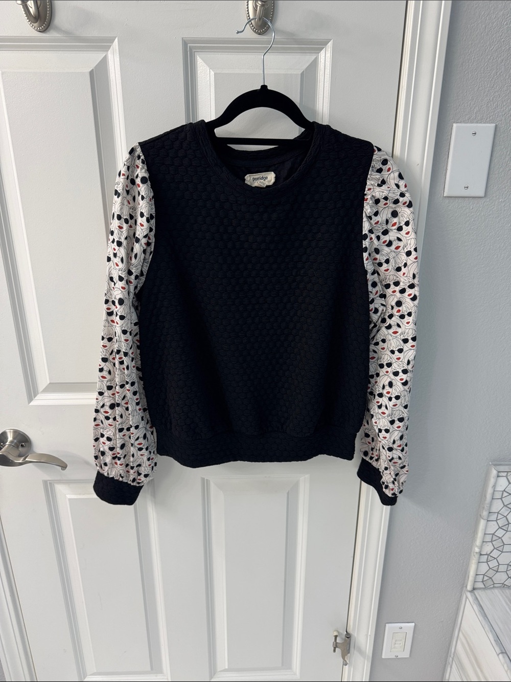 Anthropologie Black Sweater with Patterned White Puff Sleeves